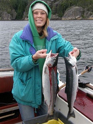Rochelle from Tooele, Utah poses with her two Sockeye Salmon caught in the Alberni Inlet.  This was Rochelles first ever fishing trip Fish caught around the China Creek area in50 feet of water