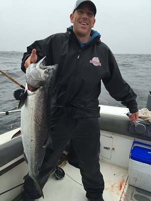 Cody landed this Chinook salmon fishing with Terry of Slivers Charters Salmon Sport Fishing.  This fish hit a green spatterback mini turd on the turtle head outside the Ucluelet Harbour
