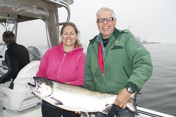 Jessica and dad John with Chinook salmon landed at Cree Island In Barkley Sound.  Salmon hit anchovy in a Green haze Rhys Davis Teaser Head.  Guide was Doug of Slivers Charters Salmon Sport fishing