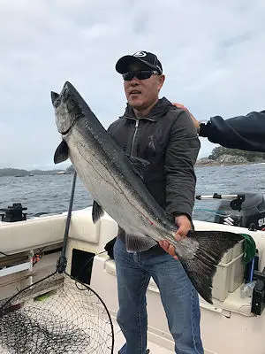 Jin from The Toronto Ontario area landed this beautiful Chinook Salmon close to Gilbraltor Island in Barkley Sound Vancouver Island fishing with Slivers Charters Salmon Sport Fishing