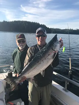 Guide Barry and 18 lb Coho landed along the Bamfield Wall in September of