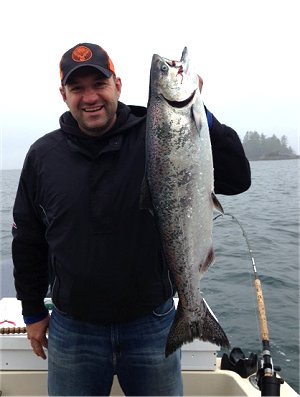 Mansel of Calgary Alberta fished with family and was guided by Doug of Slivers Charters Salmon Sport Fishing landed this twenty plus pound Chinook out in Barkley Sound Vancouver Island.  Mansel was using anchovy  in one hundred and thirty feet of water.