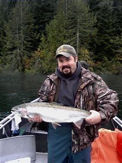 Beautiful Fall Day out on the Stamp River. Guest Jay with this big bright Steelhead was delighted with his catch