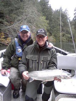 Father and son from Portland are happy with this beautiful Summer Steelhead picked up fishing with guide Bladon on the Stamp River on a beautiful late October Day.