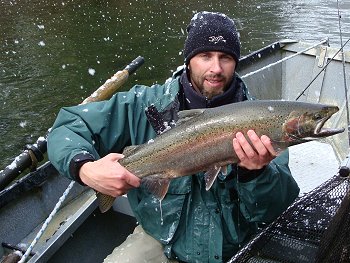 After some incredible warm afternoons we experienced a little snow on the Stamp River on Sunday and Monday morning.  Guest from Calgary displays his first steelhead of the day.  Fishing for Winter Steelhead should continue good all of March