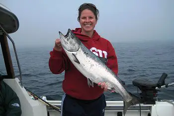 Chinook caught by Ashley Finley of Oregon out of the Ucluelet Harbour near Great Bear   This salmon was caught on an anchovy in a clear Rhys Davis Teaser Head   The guide was Doug of Slivers Charters Salmon Sport Fishing