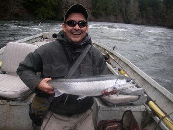 Guide Matt shows of his beautiful steelhed in the Upper Stamp river