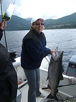 Dawn Penner of Revelstoke B.C. caught this 32 pound beauty on thursday morning with four other salmon.  Dawn fished with husband Gary and friends also from Revelstoke.  Guide was Henri of Slivers Charters Salmon Sport Fishing.  This fish and others were caught near Lone Tree Point in the Port Alberni Inlet on a red Octopus Hootch
