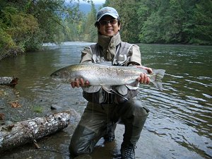 Pictured is Rakih of Japan who fished with guide Bill on the Stamp River located just outside of Port Alberni British Columbia.  This beautiful steelhead was picked up fly fishing. 