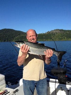 Walt and brother John from Michigan U.S.A. fished with guide Doug of Slivers Charters and had a wonderful day in the fall in Barkley Sound.  Walt landed this Coho Salmon using a white AORL 12 hootchie along the Bamfield Wall