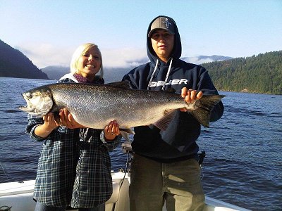 Ashley fished with Robert of Slivers 'Charters Salmon Sport Fishing and landed this 25 pound Chinook in front of Couslon's Mill.  Fish was caught on anchovy in a glow teaser head.