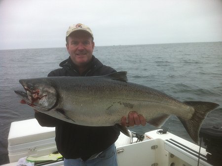 Ken of Kentucky USA fished with guide Doug of Slivers Charters Salmon Sport Fishing.  Ken landed this twenty-three pound Chinook at Meares Island using a four inch green nickel coyote spoon