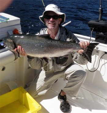 Gerry Ford   from Kansas  landed this great salmon fishing with Doug of Slivers Charters Salmon Sport Fishing.  This fish was landed in Barkley Sound.  The fishing in the sound is expected to be very good this summer.