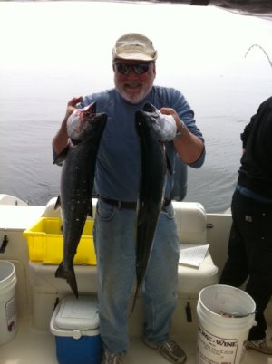 Great day of fishing on the surfline of Barkley Sound.  These Chinook were in tight to the surfline and were picked up at the fifty foot mark using anchovy in a chartreuse and green glo Rhys Davis Teaser head behind green and chartreuse hotspot flashers.  John of Vancouver is happy about his two salmon