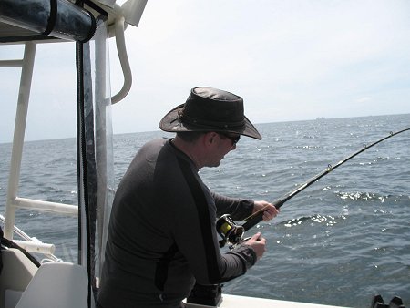 The days are improving as is the weather on the west coast of Vancouver Island British Columbia.  Ed plays a salmon from boat on a beautiful Saturday afternoon