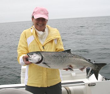 Cheryl of Kentucky fished with Doug of Slivers Charters Salmon Sport fishing Offshore and in Barkley Sound in August and had a successful trip.  Landing Chinook and Coho was a first time experience.  This Chinook was landed using a green- nickel four inch coyote spoon