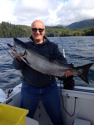 Sid from Calgary Alberta fished with Doug of Slivers Charters Salmon Sport Fishing.  Sid landed this salmon along the Bamfield Wall.  The twenty-six pound Chinook hit an anchovy is a army truck teaser head.  This Chinook was landed during the first week of September