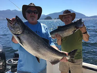 Mardie and Fred fished with Doug of Slivers Charters Salmon Sport Fishing and show off two salmon landed close to the Bamfield Wall located close to Bamfield B.C. Vancouver Island