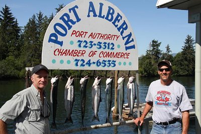 Steve from Texas with guide John on right of Slivers Charters Salmon Sport Fishing show of some of their Sockeye catch all landed in the Port Alberni Inlet 
