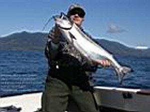 Bob  with a 16 pound Chinook caught at Great Bear off of Ucluelet B.C. on a Purple Haze Hootchie behind a purple Haze flasher