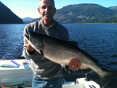 Salmon fishing in late August and early September was fantastic on the Port Alberni Inlet.  Ian (pictured) and his daughter from Vancouver, B.C. fished with guide Doug from Slivers Charters Salmon Sport fishing and had an excellent day of fishing.  This salmon was landed using anchovy in a green haze rhys davis teaser head. 