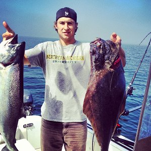 Halibut and Chinook salmon were in good numbers out at the Big Bank this summer.  Robert was guided by Doug of Slivers Charters Salmon Sport Fishing.  This Chinook and Halibut were both landed out on the Rats Nose. The two fish were landed using a Brown Turd.  Roberts family limited on Chinook, Coho and Halibut on this trip.