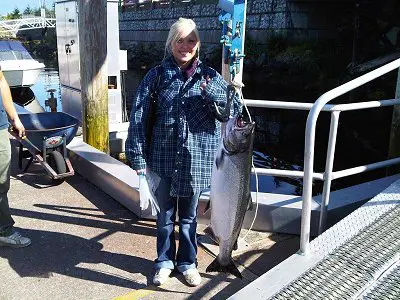 Ashley is happy about her 25 pound Chinook landed out in the Port Alberni Inlet in the summer of 2010.  Ashleys guide Was Robert of Slivers Charters who was using a 0 15 hootchie to have this Chinook landed.  Fishing predictions for the 2011 season are looking very good for sockeye and good for the Chinook fishery which begins in mid August.