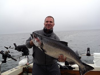 Jim from Toronto Ontario caught this 35 pound Chinook Salmon outside of the Ucluelet harbor at the south West Corner.  Jims guide Graham was using a six inch tomic spoon at 47 feet.  Jim had a group of six others arranged by Slivers Charters Salmon Sport Fishing to fish the waters outside the Ucluelet waters for three full days.