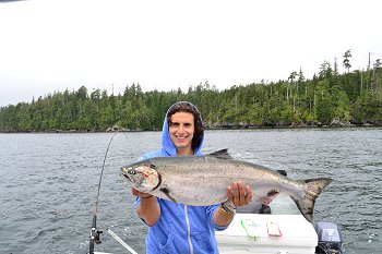 Late Summer Chinook landed by Ruven from Montreal. Ruven fished with brother and dad and landed this fish close to Pill Point in Barkley Sound using anchovy on a green haze teaser head.  Guide Doug from Slivers Charters Salmon Sport Fishing.