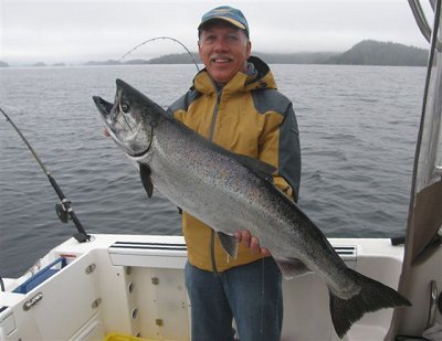 Paul of Cambridge Ontario landed this 20 pound Chinook at Swale Rock in Barkley Sound Vancouver Island.  Chinook hit anchovy in an army truck rhys davis teaser head. Guide was Doug Lindores of Slivers Charters Salmon Sport Fishing