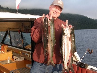 Tom from Utah USA shows off four Alberni Inlet Sockeye all landed using pnk mp hootchies.  Tom fished out of Port Alberni with Slivers Charters Salmon Sport Fishing