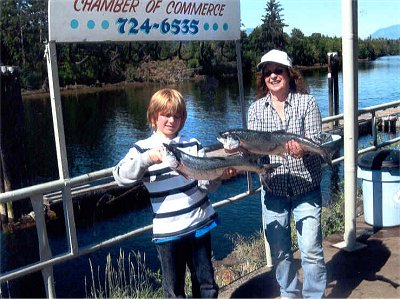 Peggy of Victoria B.C.  shows off two of her Port Alberni Inlet Somass River Sockeye.   Peggy landed both fish using bubblegum hootchies and fished with Doug Lindores of slivers Charters Salmon sport Fishing May of Nanaimo B.C. with Grandson Tomasz of Fort St. John B.C.  show some of there Sockeye catch    they fished with Doug of slivers charters salmon sport fishing close to china Creek in the Port Alberni Inlet located on Vancouver island B.C.