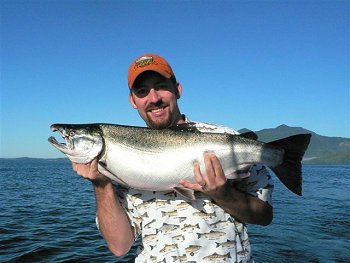 We are expecting many great salmon fishing days out on the surf line of Vancouver Island just like this picture from 2009.  The migratory salmon swimming the coastline of Vancouver Island the summer of 2010 is forecast to be even better than last summer.  Tom of California displays one of eight Coho landed with his group of four people on one beautiful day last August on the surf line of Barkley Sound Vancouver Island.  The largest Coho of the day was 20 pounds.  The largest Chinook on this day was 32 pounds.  Guide was Doug Lindores of Slivers Charters Salmon Sport Fishing.  Salmon fishing in 2010 in Barkley Sound and Port Alberni British Columbia should be spectacular.