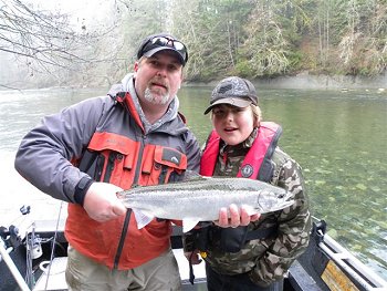 Fishing on the Stamp River is still very good.  Guide Nick has his young guest very excited about the bright chrome steelhead he picked up in the Stamp on Monday of this week.  This fish was hooked and landed below the bucket and was put back into the water.