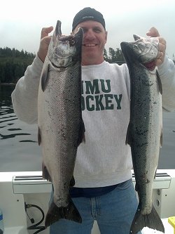 Joe from Northern Michigan with two beautiful salmon that he landed in Barkley Sound using anchovy in a green haze Rhys Davis Teaser Head.  Joe fished with Doug of Slivers Charters Salmon Sport Fishing