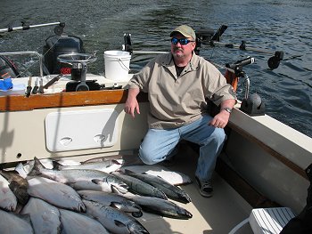 Fishing has continued to be very good offshore.   The days out on the Pacific offshore are spectacular.  In this picture Mardie of Ontario is happy as he and his three other Ontario friends had a great day landing limits of halibut, Chinook and Coho.  These fisherman fished the Big Bank and the guide was Al