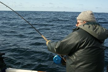 This is a picture just a mile or two off of the Ucluelet Harbour  Guest playing a Winter Chinook which he lost.  Guide was Mike.