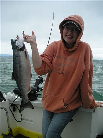 Julie from Utah is happy with her first ever Coho.  Julie has fished the Barkley Sound waters in past but always caught Chinook.  The Coho picked up at Swale Rock on anchovy in a green UV rhys Davis Teaser Head gave 