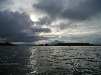 Typical June Morning in Barkley Sound. The days on the coast and in the protected waters of Barkley Sound are long and relaxing and yes beautiful. This picture is near Bamfield B.C.  Close to Kirby Point in Dougs boat of Slivers Charters Salmon Sport Fishing