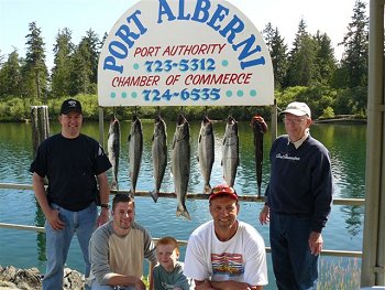 Guide John (red hat) of Slivers Charters Salmon Sport Fishing with guests from Uaha Tom, Marque Tyler and Jordan. A wonderful day on the water as they show off their fish at the Clutesi Haven Marina on Monday July 14th 2008