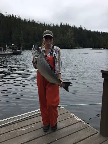 Jacinta of Calgary and Barkley Sound Lodge fished with Terry and landed this twenty-two pound Chinook using a coyote spoon