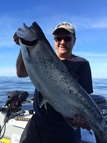 Ron with a twenty five pound Chinook landed offshore at the Rats Nose on a Coyote spoon