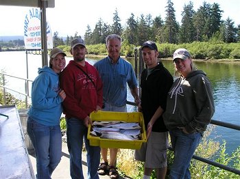 Heather, Ben, Tyler and Amber from Utah with guide Mel of Slivers Charters Salmon Sport Fishing showing some of their morning catch the last time sockeye fishing was allowed in the Inlet (2006)  This summer there will be a good return of Somass River Sockeye.  Sockeye fishing in Port Alberni is a fun sport fishery for the whole family.