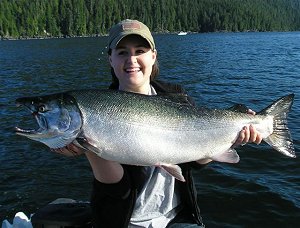 Kim Housholder from Layton Utah caught this 20lb Coho while fishing with guide Doug Lindores of slivers Charters Salmon Sport Fishing in  Barkley Sound near Pill Point
